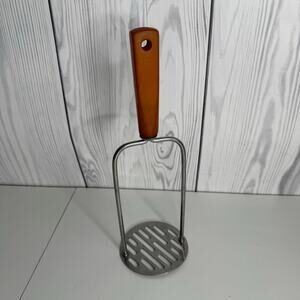 Vintage ANDROCK Potato Masher Kitchen Utensil Orange Bakelite Handle